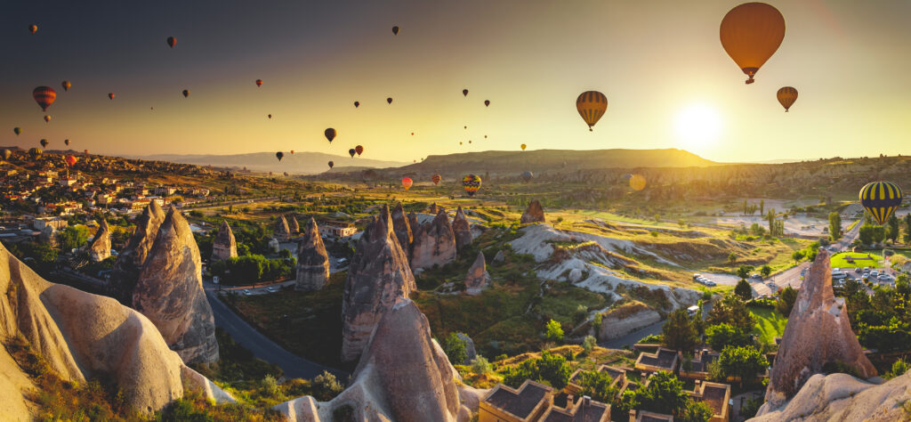 Hot air balloon flying over spectacular Cappadocia